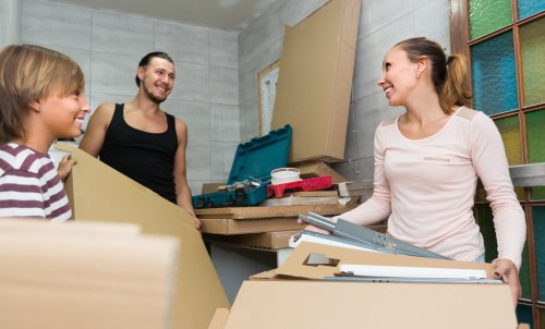 Professional movers handling office relocation at Uxbridge Self Storage