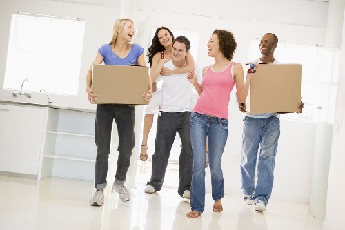 Professional movers handling household items
