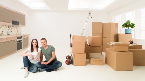 Professional movers loading a removal truck
