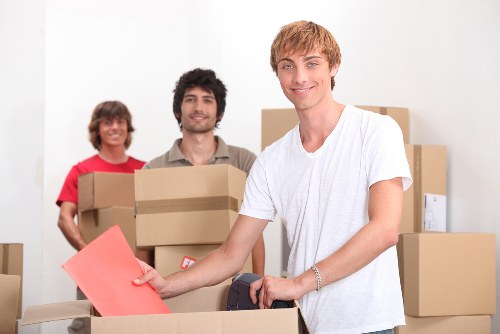 Professional movers handling furniture in Uxbridge